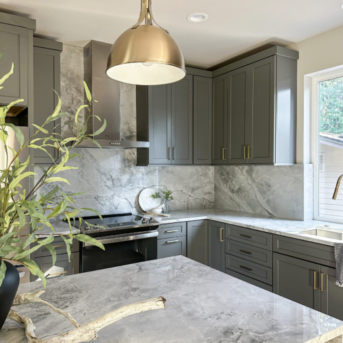 Modern kitchen featuring a sleek quartz countertop with clean lines