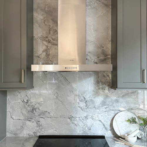 Modern kitchen featuring a sleek quartz countertop with clean lines
