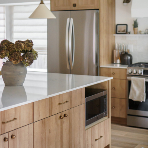 Modern kitchen featuring a sleek quartz countertop with clean lines