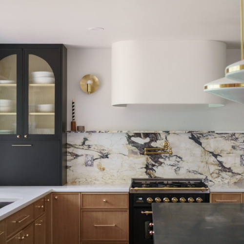 Modern kitchen featuring a sleek quartz countertop with clean lines