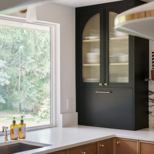 Modern kitchen featuring a sleek quartz countertop with clean lines