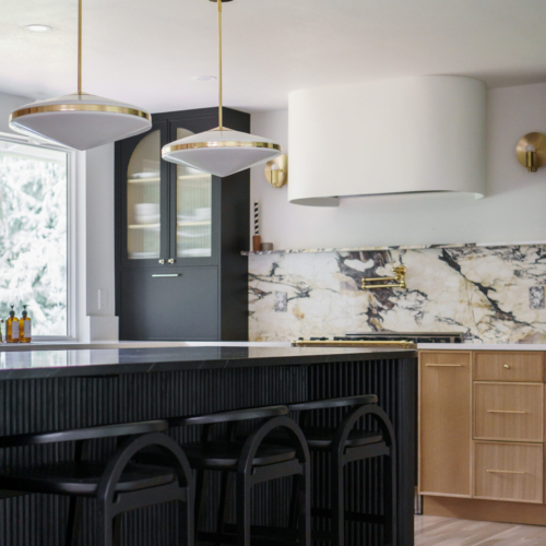 Modern kitchen featuring a sleek quartz countertop with clean lines