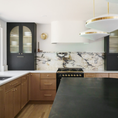 Modern kitchen featuring a sleek quartz countertop with clean lines