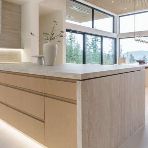 Modern kitchen featuring a sleek quartz countertop with clean lines