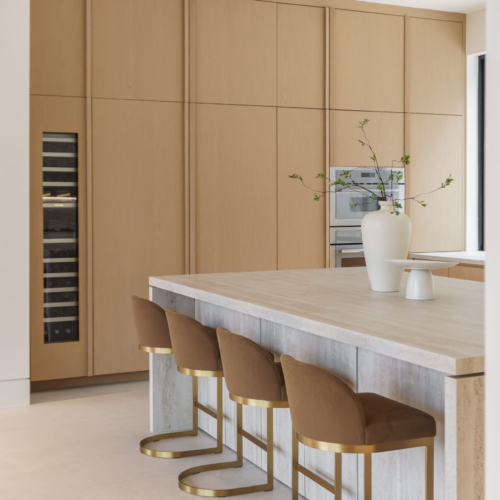 Modern kitchen featuring a sleek quartz countertop with clean lines