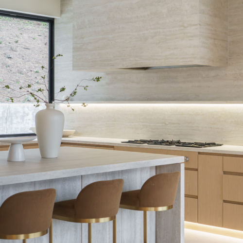 Modern kitchen featuring a sleek quartz countertop with clean lines
