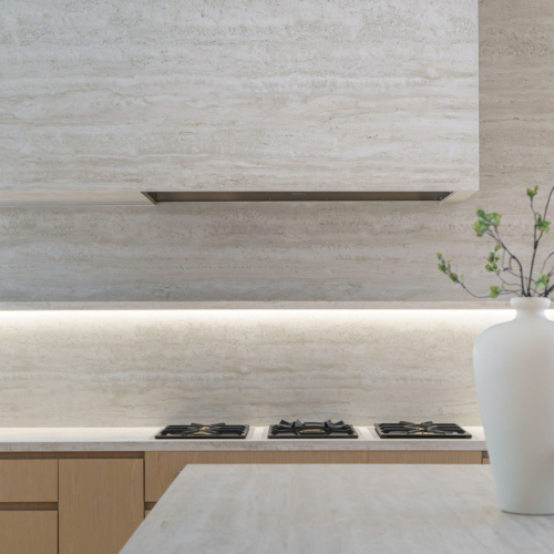 Modern kitchen featuring a sleek quartz countertop with clean lines