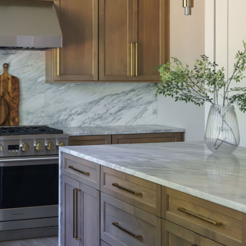 Modern kitchen featuring a sleek quartz countertop with clean lines