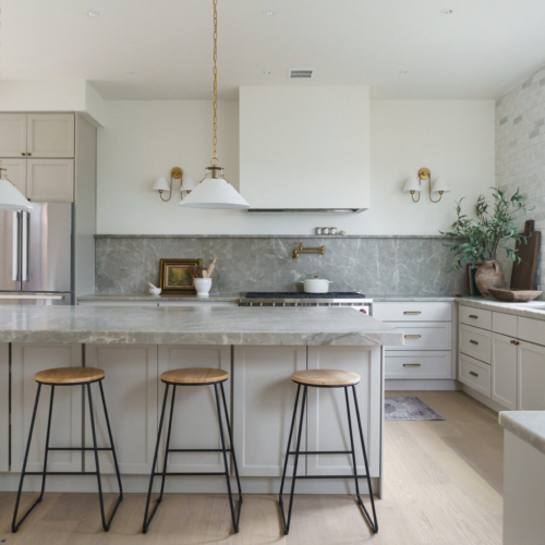 Modern kitchen featuring a sleek quartz countertop with clean lines
