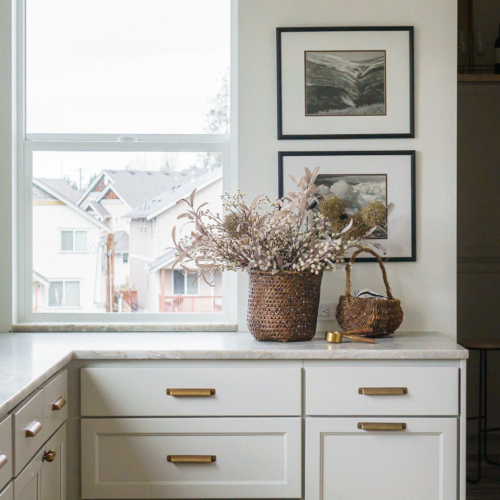 Modern kitchen featuring a sleek quartz countertop with clean lines