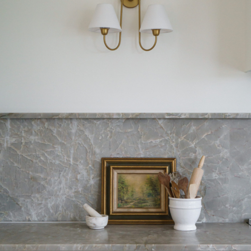 Modern kitchen featuring a sleek quartz countertop with clean lines