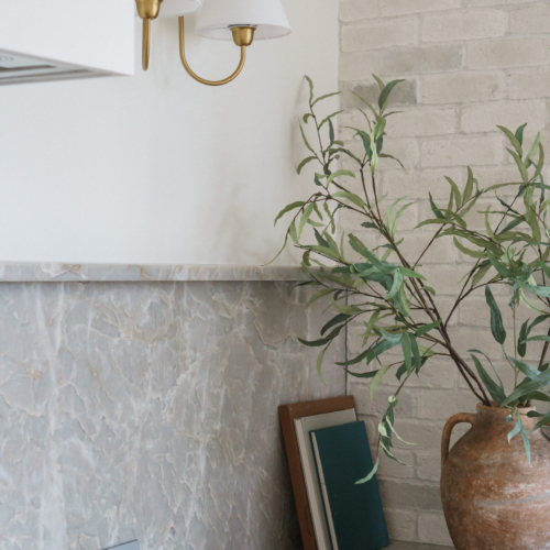 Modern kitchen featuring a sleek quartz countertop with clean lines