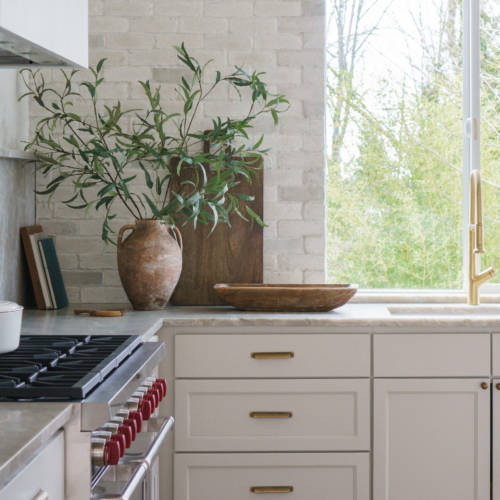 Modern kitchen featuring a sleek quartz countertop with clean lines