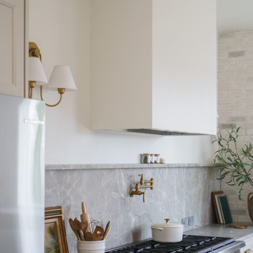 Modern kitchen featuring a sleek quartz countertop with clean lines