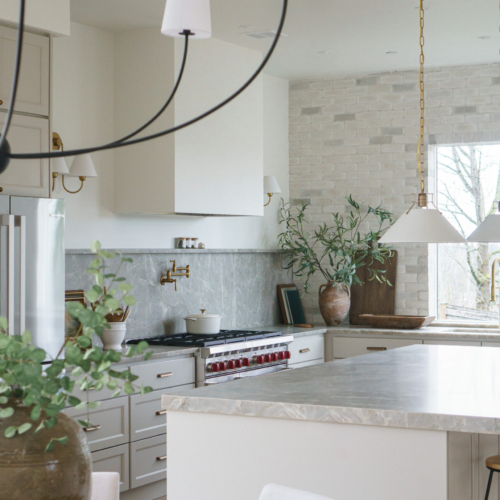 Modern kitchen featuring a sleek quartz countertop with clean lines