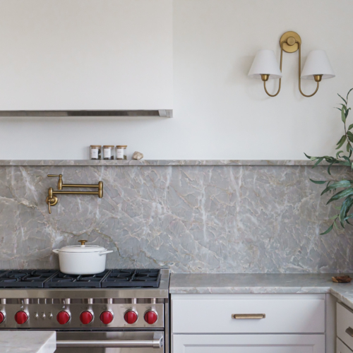 Modern kitchen featuring a sleek quartz countertop with clean lines