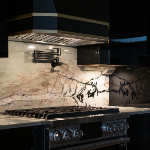 Modern kitchen featuring a sleek quartz countertop with clean lines