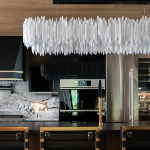 Modern kitchen featuring a sleek quartz countertop with clean lines