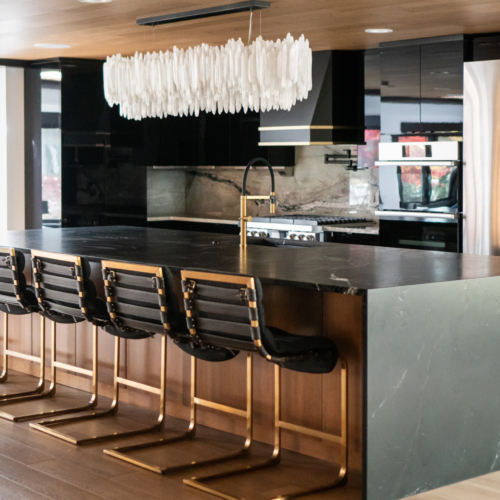 Modern kitchen featuring a sleek quartz countertop with clean lines