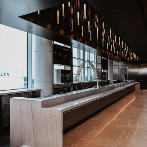 cambria-brittanicca-gold-delta-sky-lounge-102-waterfall